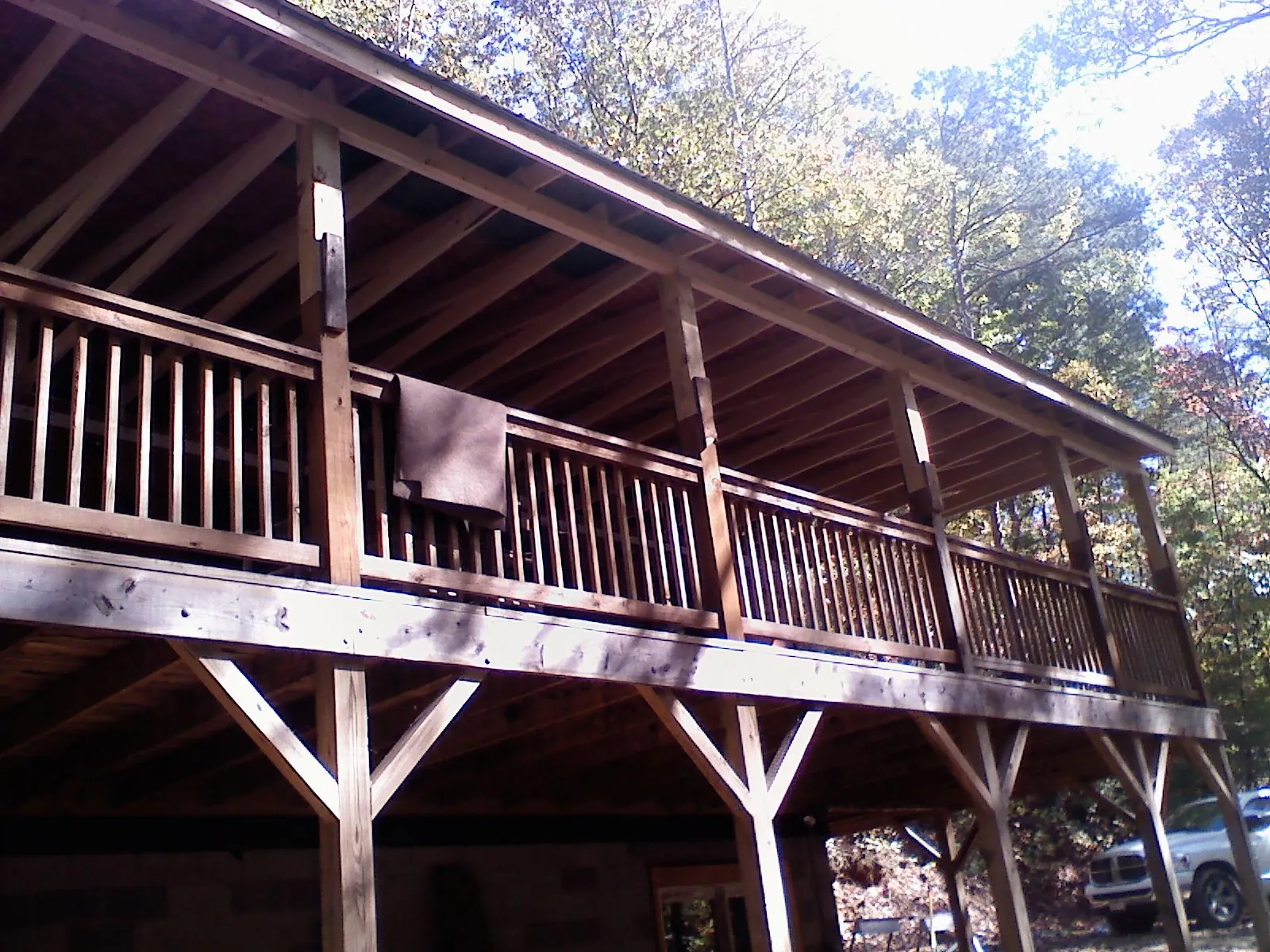 Timber framing under a new elevated porch and deck — Roof Leak Repair in Upland by Roofing Brothers